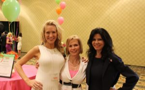 Tracie Lytle and Debbie Gaby (right)  posing with Smartfem Publisher Lea Haben (center)