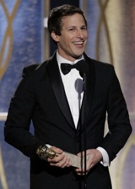 Andy Samberg giving his speech, award in hand.