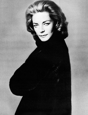 Lauren Bacall's shot for BLACKGLAMA. She wears a large, elegant black fur coat