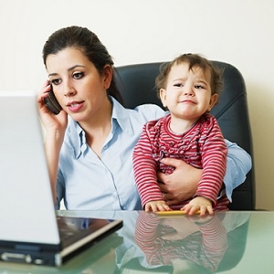 http://www.dreamstime.com/royalty-free-stock-image-businesswoman-phone-holding-daughter-image13017866