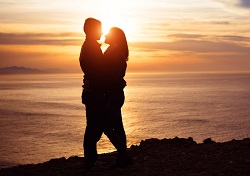 http://www.dreamstime.com/royalty-free-stock-photos-couple-love-sunset-young-towards-sea-lovers-hugging-romantic-scene-image38865098