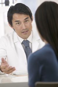 Male Doctor Talking with Patient