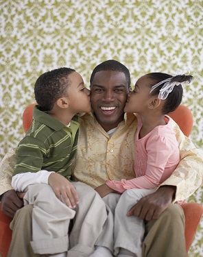 Children Kissing Their Father on His Cheeks
