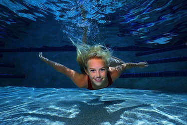 Young Girl Swimming in Pureion chemical free pool water