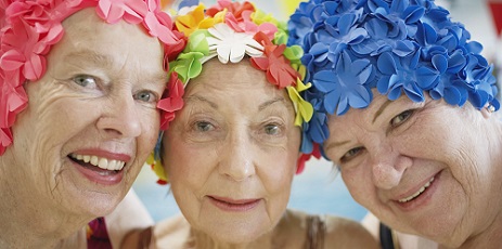 Women Wearing Colorful Bathing Caps