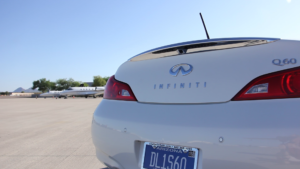 Infiniti Q60 convertible with private jets