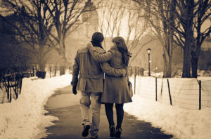 couple walking through snow