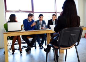 business, career and office concept - businesswoman at job interview in office