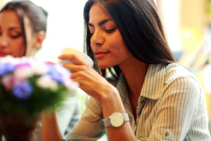 Beautiful businesswoman drinking coffee