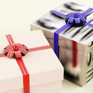 Two Gift Boxes With Blue And Red Ribbons As Presents For Him And Her