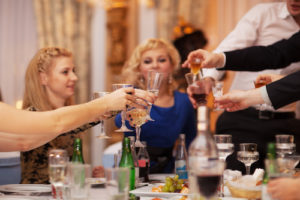 Friends raising their glasses in a toast