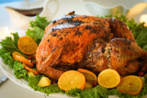 Turkey with leaves and oranges for christmas and thanksgiving