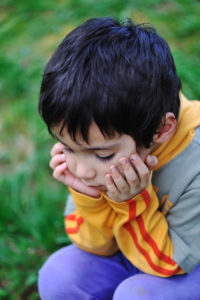 sad children in nature outdoor